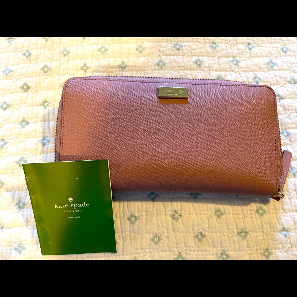 Mauve pink Kate spade wallet. Zipper. Gently used, smoke free home
